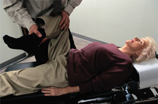 Chiropractor Working on Elderly Woman